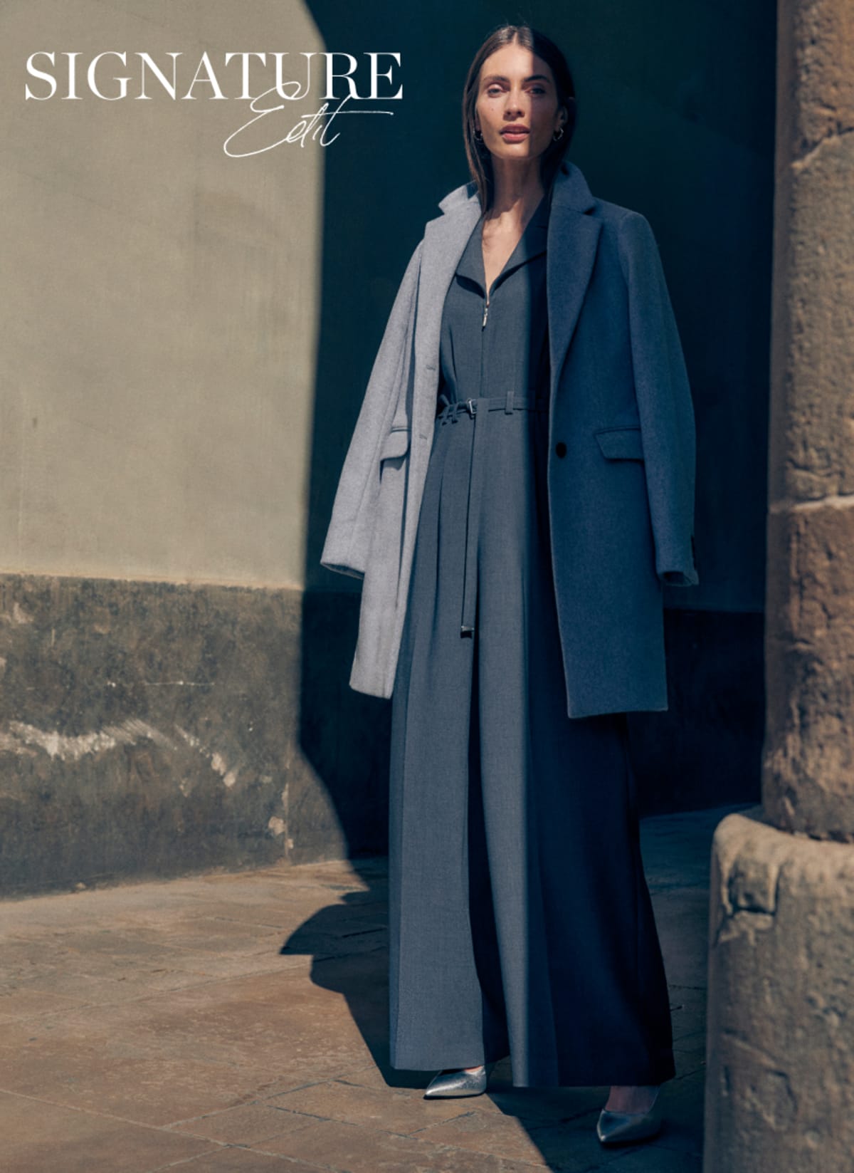 Woman wearing Phase Eight grey coat